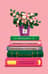 Открытка. Цветок в горшке на книге