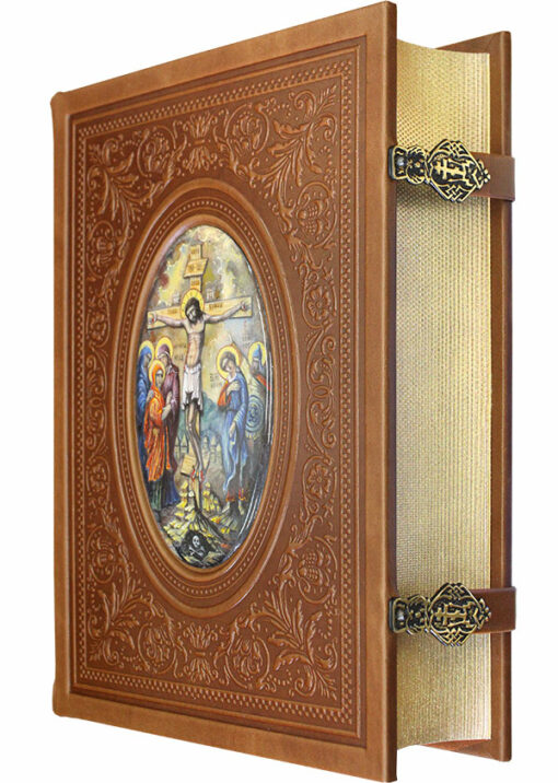 Bible in Russian in leather cover with an icon
